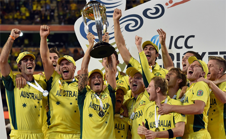 Australia's captain Michael Clarke (centre) lifts the trophy of 2015 Cricket World Cup after beating New Zealand in the final in Melbourne on March 29, 2015. (AFP)