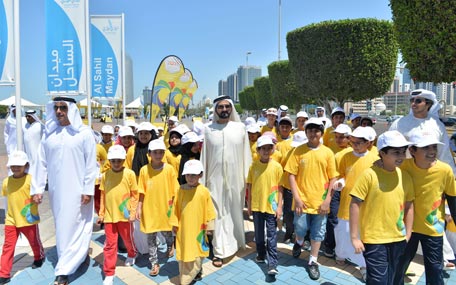 Sheikh Mohammed bin Rashid with school students as he lead the ‘Let’s Walk’ march to promote a healthy lifestyle in UAE, on the Abu Dhabi Corniche on Tuesday. (Wam)