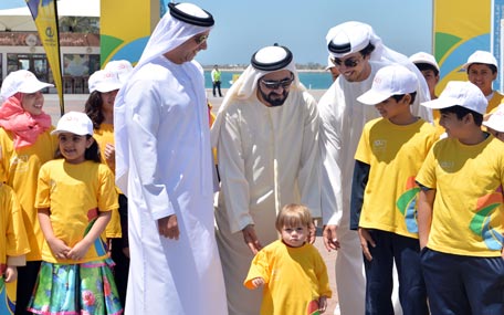 Sheikh Mohammed bin Rashid with school students as he lead the ‘Let’s Walk’ march to promote a healthy lifestyle in UAE, on the Abu Dhabi Corniche on Tuesday. (Wam)