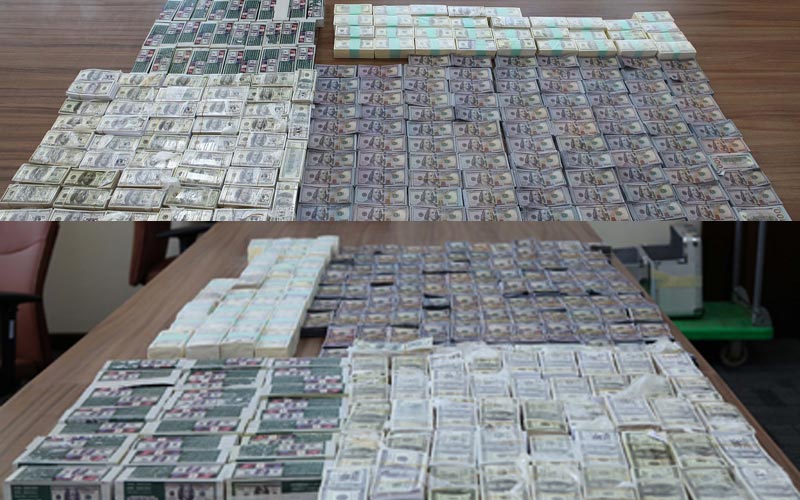 The counterfeit dollar notes amounting to $10 million seized by Abu Dhabi Police on Sunday. (Supplied)