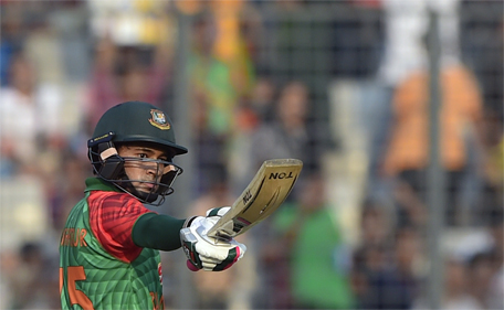 Bangladesh cricketer Mushfiqur Rahim reacts after scoring a half century during the first One Day International cricket match between Bangladesh and Pakistan at the Sher-e-Bangla National Cricket Stadium in Dhaka on April 17 , 2015. (AFP)