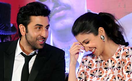 Indian Bollywood actors Ranbir Kapoor (L) and Anushka Sharma speak during a promotional event for the forthcoming Hindi film 'Bombay Velvet' directed and co-produced by Anurag Kashyap in Mumbai on late April 27, 2015. (AFP)