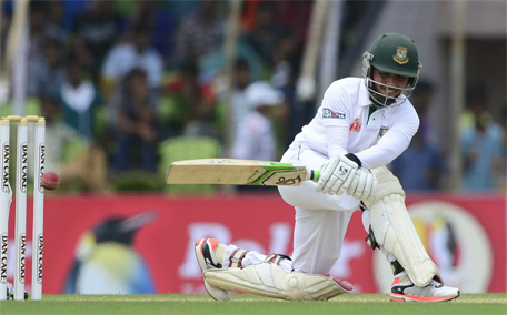 Bangladeshi batsman Mominul Haque plays a shot during the first day of the first cricket Test match between Bangladesh and Pakistan at The Sheikh Abu Naser Stadium in Khulna on April 28, 2015. (AFP)