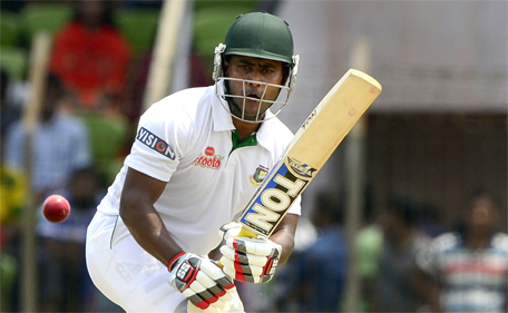 Bangladeshi batsman Imrul Kayes plays a shot during the first day of the first cricket Test match between Bangladesh and Pakistan at The Sheikh Abu Naser Stadium in Khulna on April 28, 2015. (AFP)