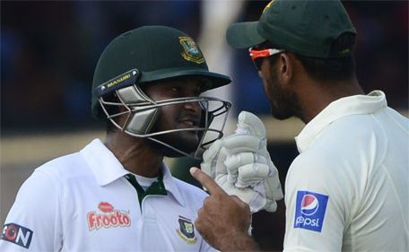 Bangladesh batsman Shakib Al Hasan (left) gets into an altercation with Pakistan bowler Wahab Riaz during the fifth day of the first cricket Test match between Bangladesh and Pakistan at The Sheikh Abu Naser Stadium in Khulna on May 2, 2015. (AFP)