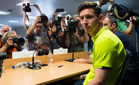 Lionel Messi of FC Barcelona faces the media during a press conference ahead of their UEFA Champions League semi-final first leg match against FC Bayern Muenchen at Ciutat Esportiva on May 5, 2015 in Barcelona, Spain. (Getty Images)