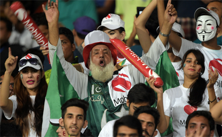 Pakistani spectators watch the first International T20 cricket match between Pakistan and Zimbabwe at the Gaddafi Cricket Stadium in Lahore on May 22, 2015. (AFP)