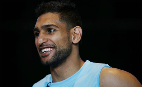 Amir Khan poses after the press conference at Barclays Center, Brooklyn, New York City, United States of America - 27/5/15. (Action Images via Reuters / Andrew Couldridge)