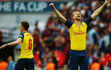 Per Mertesacker of Arsenal celebrates during the FA Cup Final between Aston Villa and Arsenal at Wembley Stadium on May 30, 2015 in London, England. (Getty)
