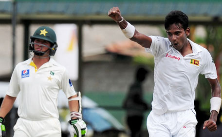 Sri Lanka's Dushmantha Chameera celebrates his maiden Test wicket on day one of the 2nd Test between Sri Lanka and Pakistan at  P Sara Oval in Colombo, June 25, 2015. (AFP)