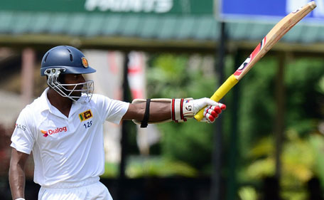Sri Lanka's Kaushal Silva completes his half century on day two of the 2nd Test between Sri Lanka and Pakistan at P Sara Oval in Colombo on June 26, 2015. (AFP)
