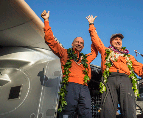 Bertrand Piccard and André Borschberg are reunited in Hawaii and celebrate together the world record for longest solo flight ever flown by the latter. (Supplied)