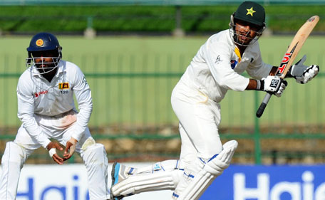Pakistan's batsman Sarfraz Ahmed plays a shot on the second day of the third Test against Sri Lanka at Pallekele on July 4, 2015. (AFP)