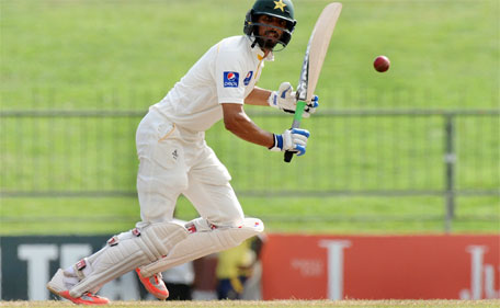 Pakistan batsman Shan Masood plays a shot during the fourth day of the third and final Test match between Sri Lanka and Pakistan at the Pallekele International Cricket Stadium in Pallekele on July 6, 2015. (AFP)