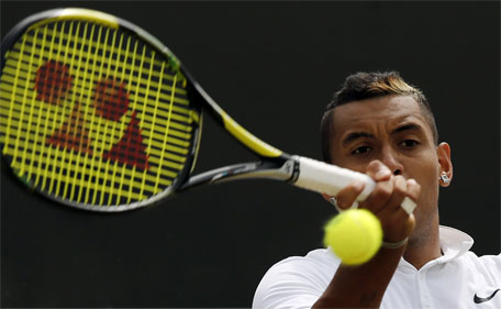 Australia's Nick Kyrgios returns against France's Richard Gasquet during their men's singles fourth round match on day seven of the 2015 Wimbledon Championships at The All England Tennis Club in Wimbledon, southwest London, on July 6, 2015. (AFP)