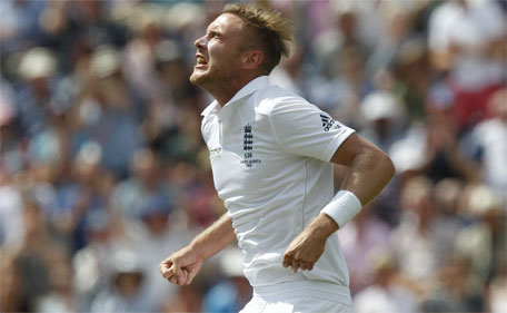 England’s Stuart Broad celebrates taking the wicket of Australia’s Chris Rogers on the fourth day of the opening Ashes cricket test match between England and Australia at The Swalec Stadium in Cardiff, Wales, on July 11, 2015. (AFP)