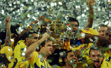 In this photograph taken on May 29, 2011, Chennai Super Kings players celebrate with the trophy after the IPL Twenty20 cricket final match between Chennai Super Kings and Royal Challengers Bangalore at The M.A.Chidambaram Stadium in Chennai. (AFP)