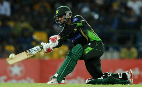 Pakistan cricketer Mohammad Hafeez plays a shot during the fourth One Day International (ODI) match between Sri Lanka and Pakistan at the R Premadasa International Cricket Stadium in Colombo on July 22, 2015. (AFP)
