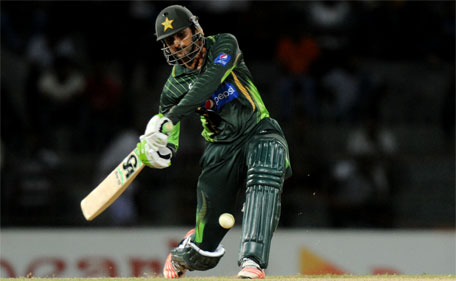 Pakistani cricketer Shoaib Malik plays a shot during the fourth One Day International (ODI) match between Sri Lanka and Pakistan at the R Premadasa International Cricket Stadium in Colombo on July 22, 2015. AFP