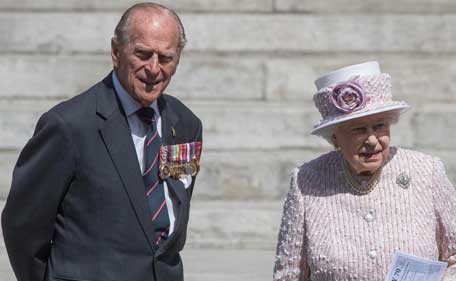 Britain's Queen Elizabeth and Prince Phillip leave St Martin's in the Fields church after attending a service to commemorate the 70th anniversary of VJ Day in London, Britain August 15, 2015. (Reuters)