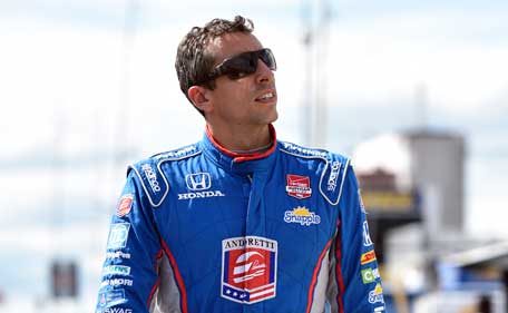 Justin Wilson, of England, walks on pit road during qualifying for Sunday's Pocono IndyCar 500 auto race, Saturday, Aug. 22, 2015, in Long Pond, Pa. Wilson was injured during Sunday's race and air lifted to the hospital. (AP)
