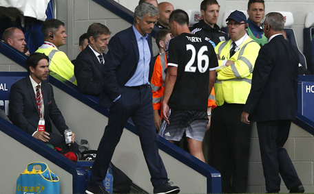 Chelsea's English defender John Terry (C) walks off the pitch after receiving a red card during the English Premier League football match between West Bromwich Albion and Chelsea at The Hawthorns in West Bromwich, central England on August 23, 2015. (AFP)