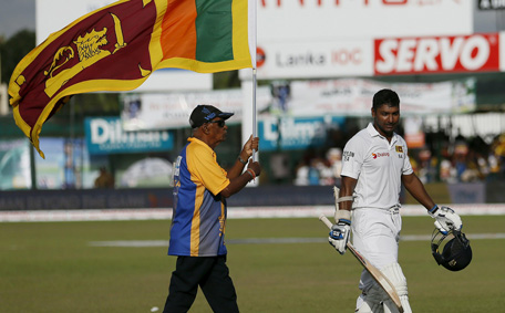 Sri Lanka's Kumar Sangakkara (R) walks off the field after his dismissal during the fourth day of their second test cricket match against India in Colombo August 23, 2015.  (REUTERS)