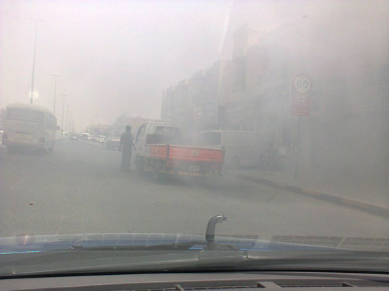 Smoke spreads all around the road as the vehicle catches fire (VM Sathish)