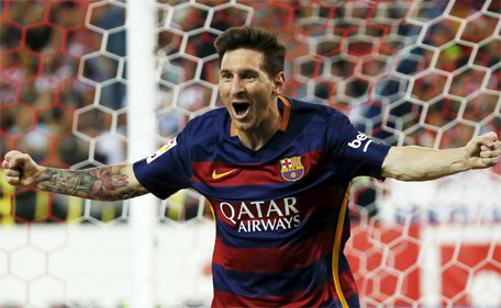 Barcelona's Lionel Messi celebrates after scoring a goal against Atletico Madrid during their Spanish first division soccer match at Vicente Calderon stadium in Madrid, September 12, 2015. (Reuters)