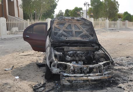 The victim's vehicle with burns visible on it (Supplied)