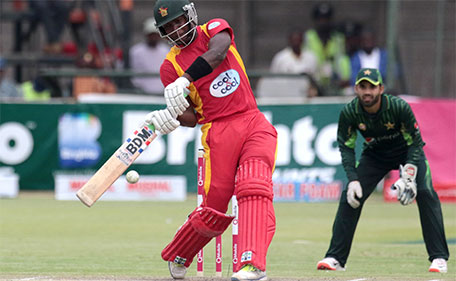 Zimbabwe captain Elton Chigumbura plays a shot during the second of two T20 cricket matches between Pakistan and hosts Zimbabwe at Harare Sports Club, September 29, 2015. (AFP)