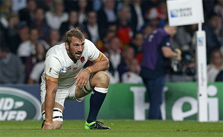 England's captain Chris Robshaw reacts after Bernard Foley scored a try during the Rugby World Cup Pool A match between England and Australia at Twickenham stadium in London, Saturday, Oct. 3, 2015. (AP)