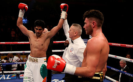 Vijender Singh of India celebrates after defeating Sonny Whiting of Great Britain during their International Middleweight contest at Manchester Arena on October 10, 2015 in Manchester, England. (Getty Images)