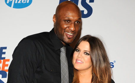 Lamar Odom (L), basketball player with the Dallas Mavericks of the NBA, and his wife Khloe Kardashian-Odom arrive for the 19th annual Race to Erase MS Gala in Los Angeles in this May 18, 2012, file photo. (Reuters)