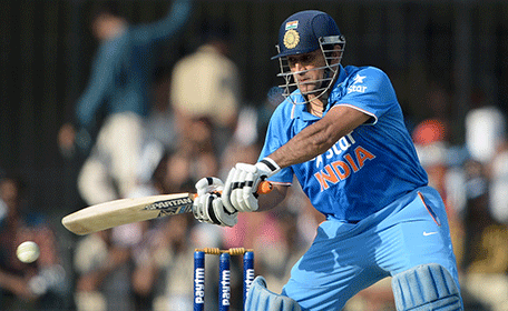 India's captain Mahendra Singh Dhoni plays a shot during the second one day international (ODI) cricket match between India and South Africa at The Holkar Cricket Stadium at Indore on October 14, 2015. AFP