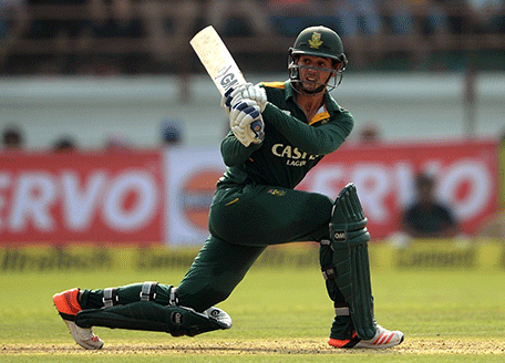 South Africa's batsman Quinton de Kock plays a shot during the third one day international (ODI) cricket match between India and South Africa at The Saurashatra Cricket Association Stadium in Rajkot on October 18, 2015.  AFP