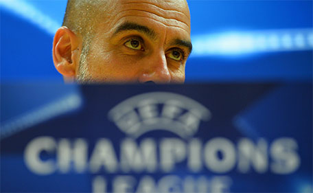 Bayern Munich'scoach Pep Guardiola attends a press conference at the Emirates Stadium in London, on October 19, 2015, on the eve of their UEFA Champions League group stage F football match against Arsenal. (AFP)