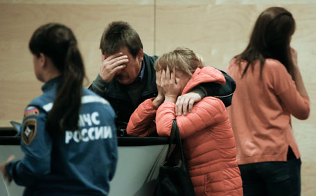 Relatives and the friends of those on the Metrojet flight that crashed in Egypt react while gathering to grieve at a hotel near St. Petersburg's Pulkovo airport outside St.Petersburg, Russia, Saturday, Oct. 31, 2015. Russia's civil air agency is expected to have a news conference shortly to talk about the Russian Metrojet passenger plane that Egyptian authorities say has crashed in Egypt's Sinai peninsula. (AP)