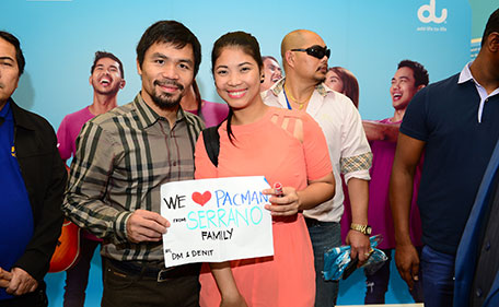 Manny Pacquiao with one of the lucky winners of a contest organised by du during a promotional visit to Dubai Mall on Wednesday. (Supplied)