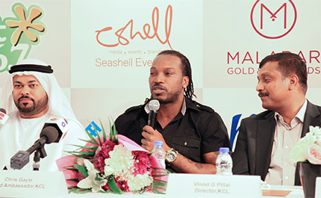 Ghazi Al Madani (left) of Dubai Sports Council, Chris Gayle (centre), KCL brand ambassador, and Vinod G Pillai, KCL director at a press conference on Wednesday. (Supplied|)