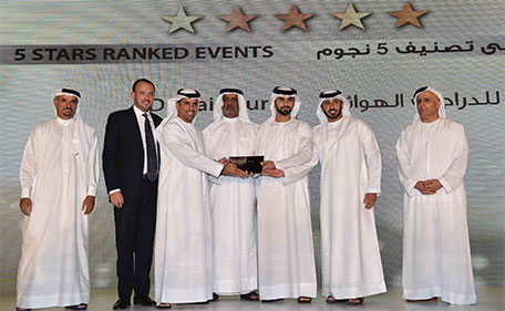 Dubai Tour officials receiving the award from Sheikh Mansoor bin Mohammed bin Rashid Al Maktoum, Chairman of the Dubai International Marine Club. (Supplied)