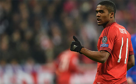 Bayern Munich's Brazilian midfielder Douglas Costa reacts during the UEFA Champions League Group F football match between FCB Bayern Munich and Olympiakos Piraeus on November 24, 2015 at the 'Allianz Arena' in Munich, Germany. (AFP)