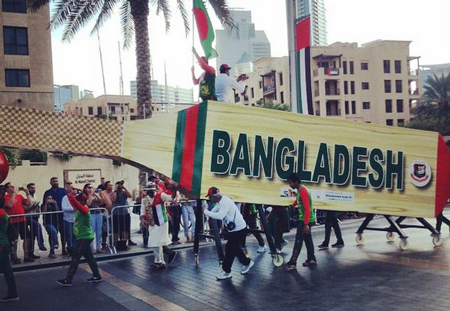 Downtowndubai @ Instagram: The #Bangladesh team walking on #MBRBlvd for the #ParadeDowntown #UAE44