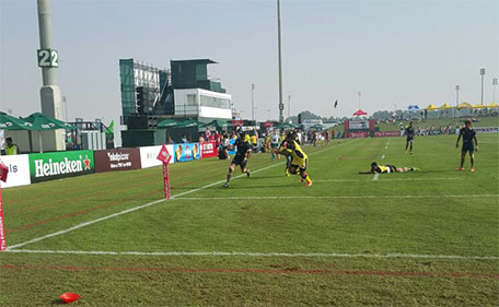 Lanka Lions captain Madishan Silva on his way to score a try against Kuwait Scorpions during the Gulf Men's Open Trophy semifinals at the Emirates Airline Dubai Rugby Sevens tournament at The Sevens stadium on Saturday. (ALLAAM OUSMAN)