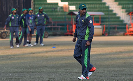 Pakistani cricketer Mohammad Amir looks on as he takes part in a team practice session for the Pakistan Super League (PSL) in Lahore on December 24, 2015. (AFP)