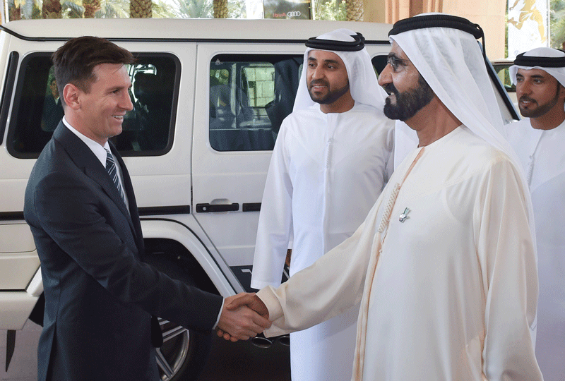 Sheikh Mohammed in Rashid Al Maktoum shaking hands with footballer Lionel Messi at the 10th Dubai International Sports Conference at Jumeirah City Resort on Sunday. (Wam)