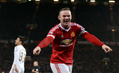 Manchester United's English striker Wayne Rooney celebrates scoring his team's second goal during the English Premier League football match between Manchester United and Swansea City at Old Trafford in Manchester, north west England, on January 2, 2016. (AFP)