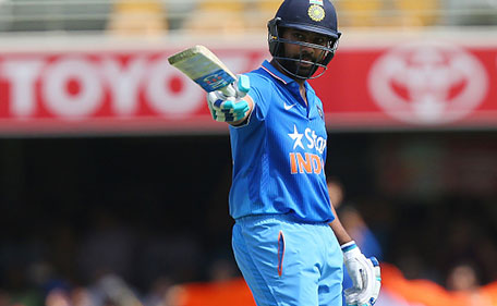 Rohit Sharma of India celebrates his half century during game two of the Victoria Bitter One Day International Series between Australia and India at The Gabba on January 15, 2016 in Brisbane, Australia. (Getty Images)