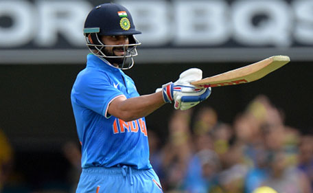 Virat Kohli of India celebrates scoring a half century during game two of the Victoria Bitter One Day International Series between Australia and India at The Gabba on January 15, 2016 in Brisbane, Australia. (Getty Images)