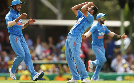 Rishi Dhawan of India celebrates taking the wicket of George Bailey of Australia during game five of the Commonwealth Bank One Day Series match between Australia and India at Sydney Cricket Ground on January 23, 2016 in Sydney, Australia. (Getty Images)